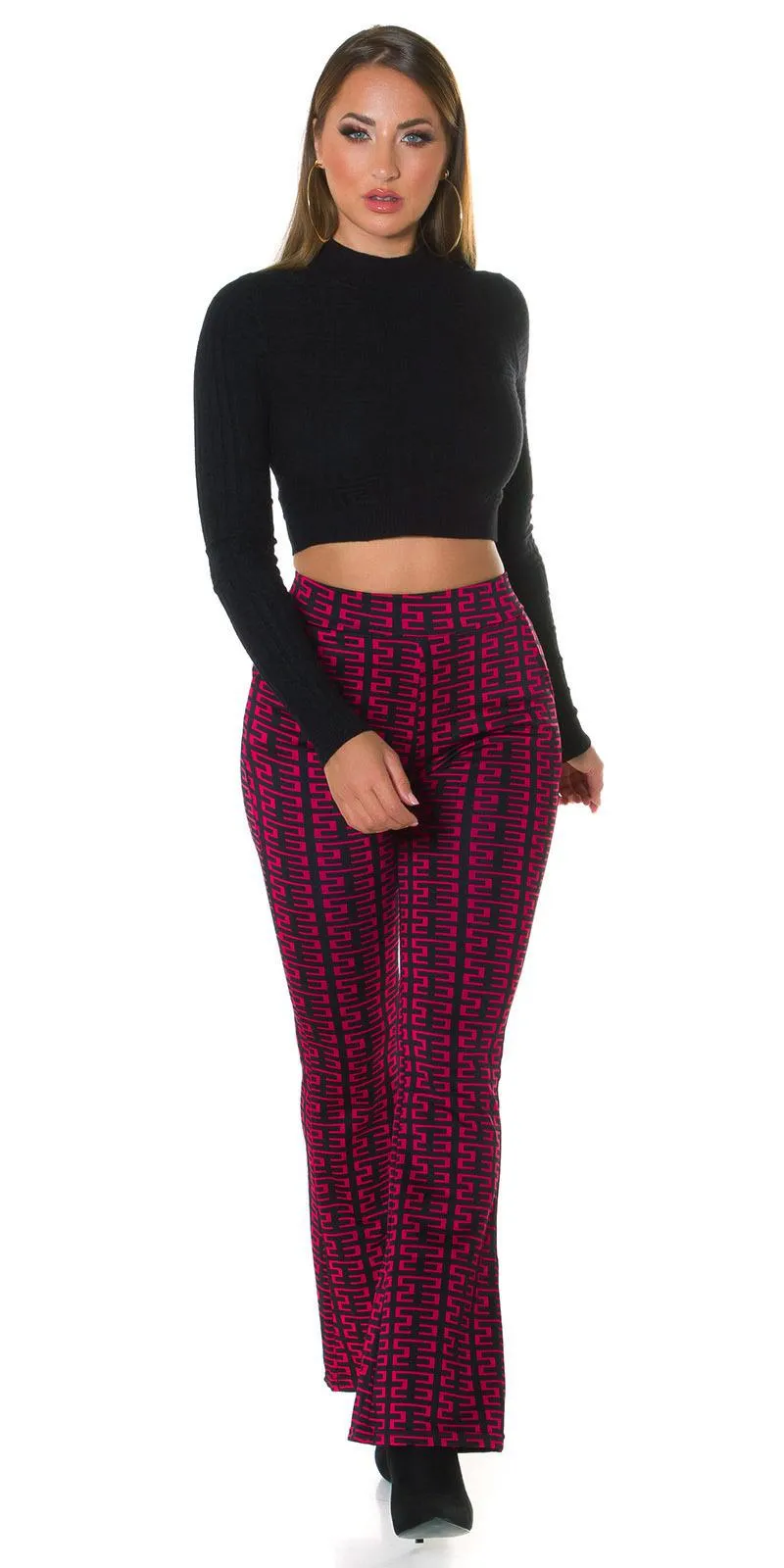 Pantalones acampanados estampados rosa